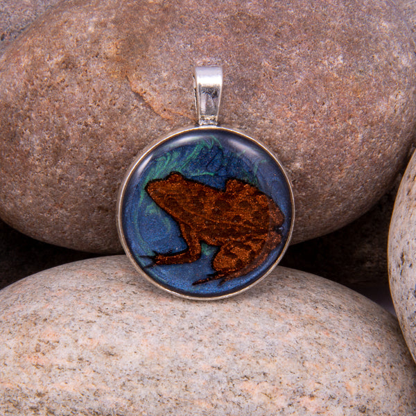 Handcrafted Bespoke Tulgey wood frog Pendant; set in Silver Effect metal bezel.| Jabbawocky Crafts (jabbawockycrafts.co.uk)